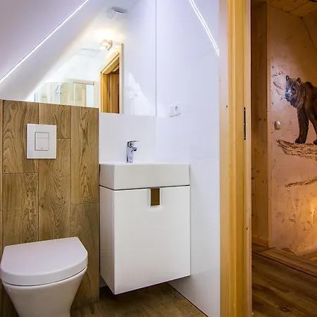 فيلة Udanypobyt Domy Highlander House *